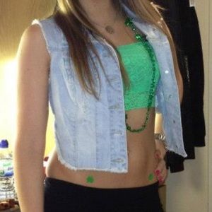 Size S/M- UK size 10. Vintage Denim Vest with rips